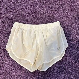 white nike running shorts